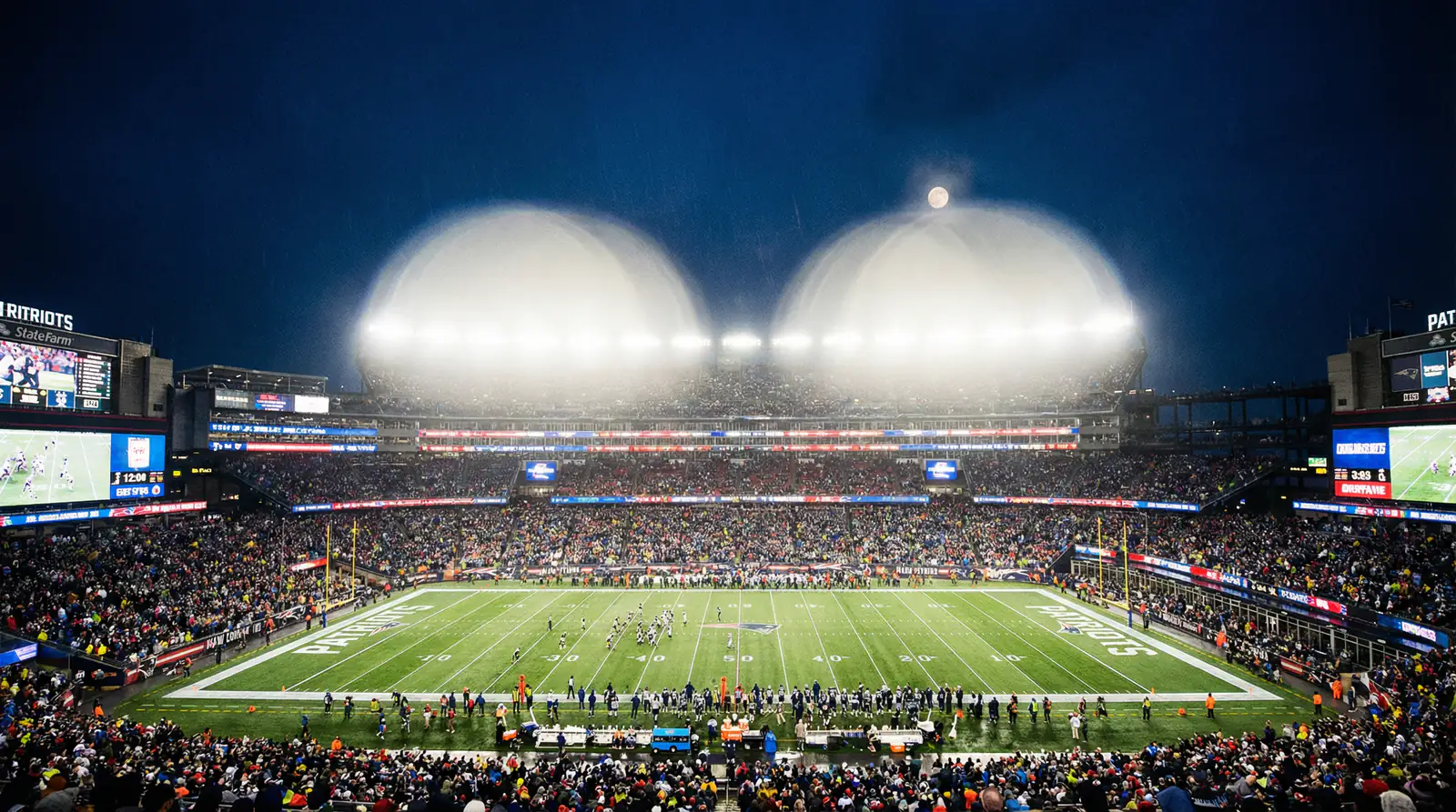 Estadio de fútbol americano iluminado para un partido nocturno del Monday Night Football