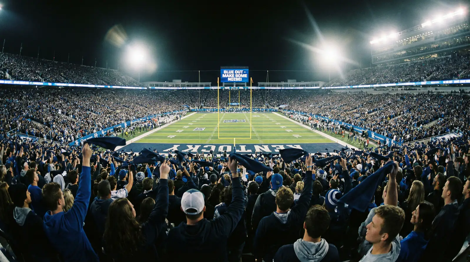 Estadio de fútbol americano lleno de aficionados locales creando un ambiente intimidante